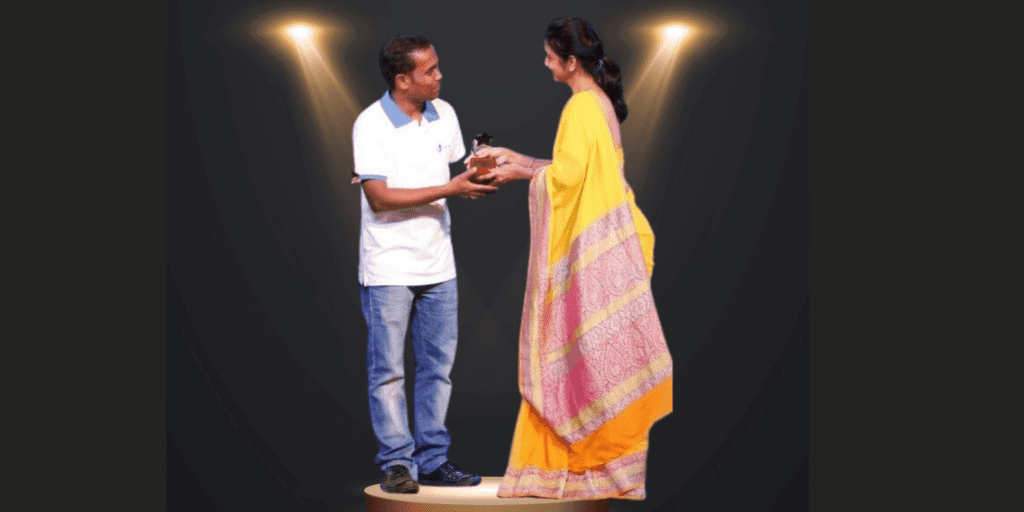 Receiving Best Employee Award at Granules India Ltd recognition event